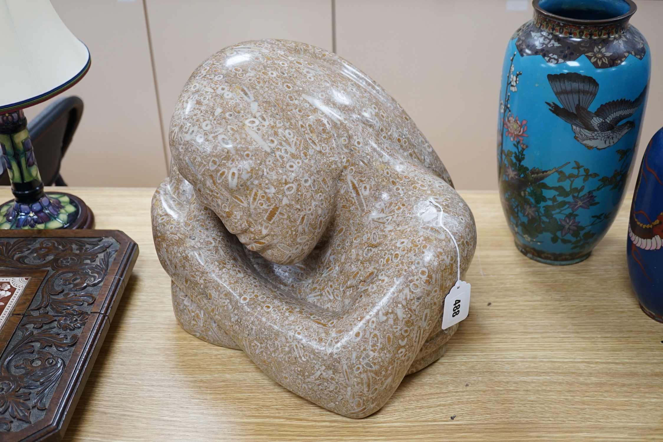 Polly Ionides (b. 1944), a Swaledale fossil stone bust of a lady, ‘Daydream’, 41cm wide